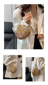 Detail of heart-shaped evening bag featuring gold sequins and floral bead embroidery