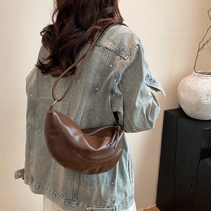 Chic dark brown crescent moon underarm bag with smooth leather finish for women