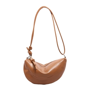 Brown semi-circle croissant shoulder bag with knot detail on smooth faux leather