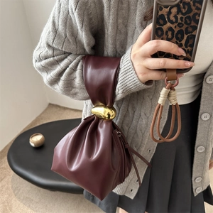 Elegant wine red pleated bucket bag with gold metal buckle decoration for women