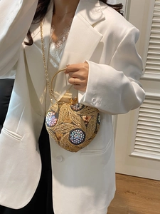 Sequin heart-shaped evening bag with gold floral embroidery and ring handle