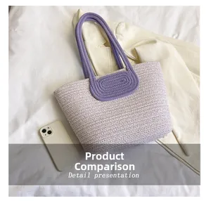 Detail view of purple woven tote bag showing size comparison with a mobile phone