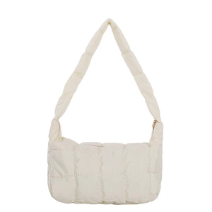 Minimalist white quilted nylon puffer tote bag with padded handles on white background