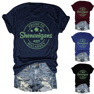 Detail of St. Patrick's Day cotton T-shirt showing multiple colors and clover graphic
