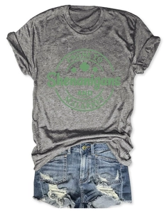 Detailed flat lay of St. Patrick's Day cotton t-shirt with festive shamrock green graphic
