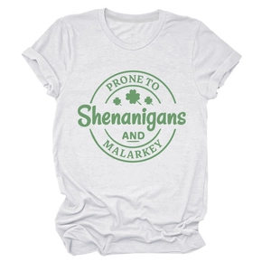 Detail of green shamrock badge print on white cotton short sleeve t-shirt for women