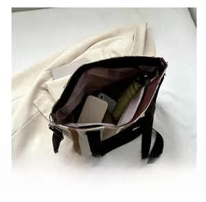 Interior view of the striped canvas tote bag showing large capacity for essentials