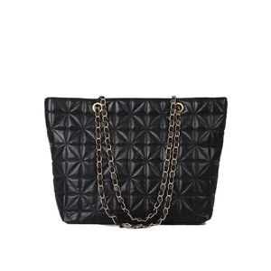 Classic black quilted tote bag with golden chain straps and spacious diamond pattern