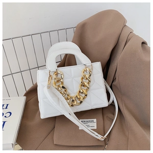 White quilted faux leather handbag with chunky gold chain and adjustable strap