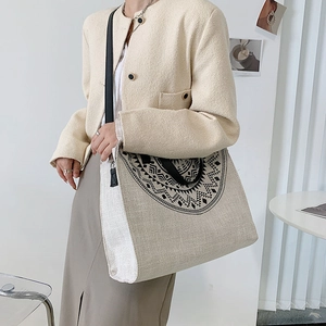 Minimalist canvas tote bag for women featuring ethnic mandala print and black straps