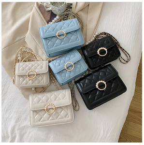 Quilted mini crossbody bags with pearl circle clasp and chain straps in multiple colors