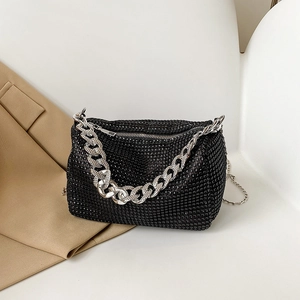 Elegant black rhinestone cylinder bag with silver metal chain strap and luxury finish