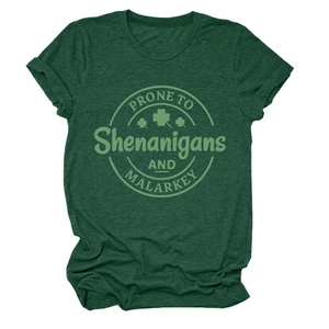Detailed close-up of dark green t-shirt with vintage clover graphic and text design