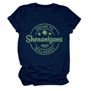 Detail shot of navy blue cotton t-shirt with green Shamrock Shenanigans graphic