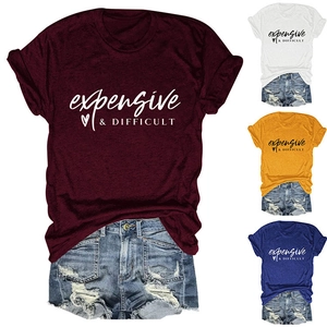 Close-up of heart print and expensive & DIFFICULT text on casual cotton t-shirts