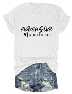 Macro shot of white cotton t-shirt with expensive and difficult print and denim shorts