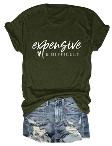 Detail view of dark green T-shirt with expensive and difficult print and denim shorts