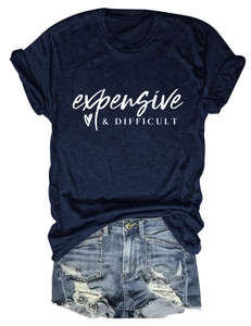 Flat lay of navy crew neck T-shirt with expensive & difficult print and denim shorts