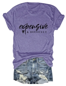 Detail of purple letter print t-shirt and distressed blue denim shorts summer set
