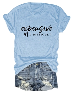 Close-up of light blue cotton t-shirt with 'expensive & DIFFICULT' print and heart motif