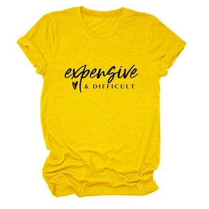 Close-up of heart and text print on bright yellow cotton t-shirt with rolled sleeves