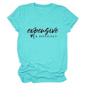 Detail view of teal crew neck t-shirt with expensive & difficult print and heart pattern