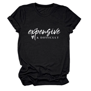 Flat lay of a black cotton crew neck t-shirt featuring expensive & DIFFICULT white graphic