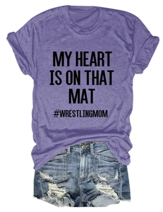 Detail view of heather grey T-shirt with My Heart Is On That Mat print and denim shorts