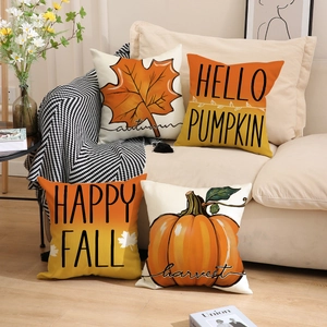 Autumn throw pillow cases set of 4 with pumpkin and maple leaf patterns on sofa