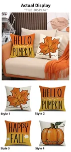 Close-up of autumn pumpkin and maple leaf prints on minimalist linen throw pillows