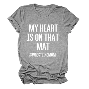 Flat lay detail of heather grey t-shirt featuring MY HEART IS ON THAT MAT print