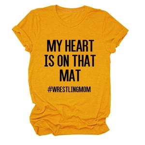 Detail of yellow round neck T-shirt with My Heart Is On That Mat wrestling print