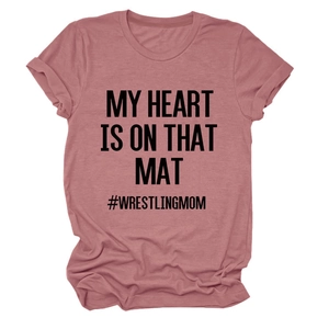 Close-up detail of mauve cotton T-shirt with My Heart Is On That Mat wrestling print