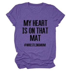 Detail of purple cotton T-shirt featuring My Heart Is On That Mat wrestling mom print