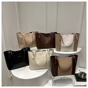 Detailed display of vintage tote bags in six colors with adjustable straps and leather texture