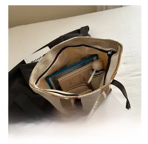 Top view of striped canvas tote bag showing large capacity for tablet and daily items