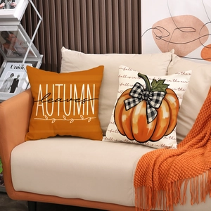 Autumn throw pillow covers set with pumpkin and maple leaf patterns on linen fabric