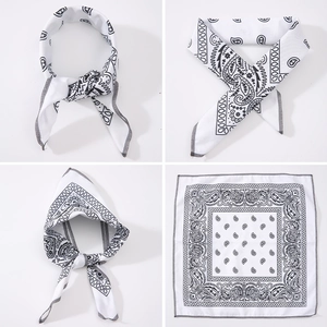 White Paisley bandana featuring a classic black teardrop pattern and reinforced grey edges