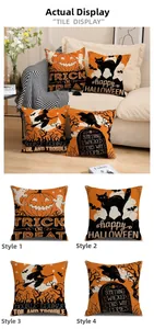Detail view of four Halloween linen pillow covers with pumpkin and black cat prints