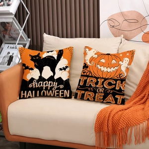 Halloween decorative linen pillow covers set featuring black cat and pumpkin on sofa