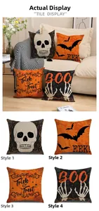 Detail of four Halloween linen pillow covers with skull, bat and spider web patterns