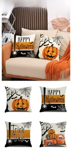 Detail of four Halloween linen pillow covers with pumpkin, spider web and bat patterns