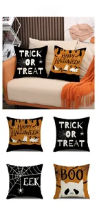 Detailed Halloween pillow case set with spider web and ghost prints on a beige sofa