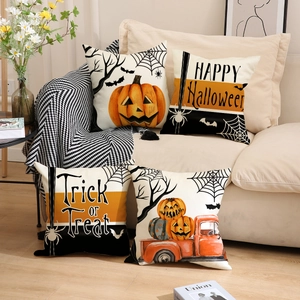 Set of four Halloween throw pillow covers featuring pumpkins and bats on a sofa