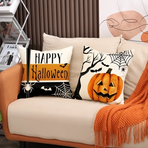 Minimalist Halloween pumpkin cushion covers set with Happy Halloween prints on sofa