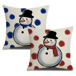 Set of two Christmas snowman pillow covers with red and blue accents on white background
