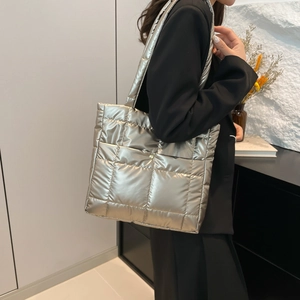 Quilted silver tote bag in metallic finish with spacious shoulder strap design
