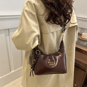 Glossy dark brown leather Hobo bag with gold COIH 2DN logo and adjustable strap