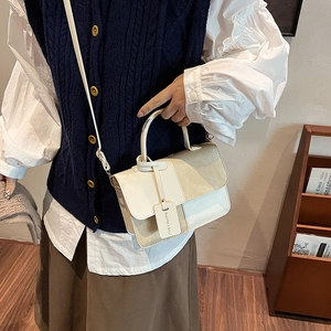 Minimalist color-block flap crossbody bag for women with leather handle and fashion tag