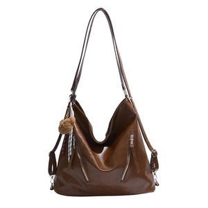 Vintage brown PU leather tote bag with silver zippers and a cute plush bear pendant